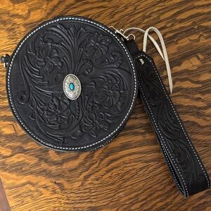 Round Tooled Black Leather Wristlet with Turquoise Concho Accent